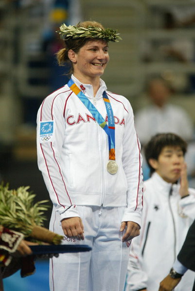 Canada's Tonya Verbeek of Beamsville, Ont., won the silver medal in the 55 kg category in women's wrestling at the Olympic Games in Athens, Monday, August 23, 2004.  (CP PHOTO)2004(COC-Mike Ridewood)
