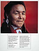 Page 31 du livre de cuisine ALBERTA PICTORIAL COOKBOOK présentant une  photo très colorée d'une Autochtone en costume traditionnel couvrant plus de la moitié de la page et sous laquelle se trouve une recette de pain autochtone