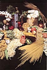 Page 35 of cookbook, THE UMBERTO MENGHI COOKBOOK, with a full-page photograph of pastas, vegetables, garlic and vegetables