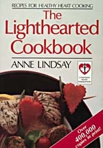 Cover of cookbook, THE LIGHTHEARTED COOKBOOK, with a photograph of a fish kebab with heart-shaped carrots