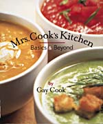 Cover of cookbook, MRS. COOK'S KITCHEN: BASICS AND BEYOND, with a photograph showing three different kinds of soup or sauces